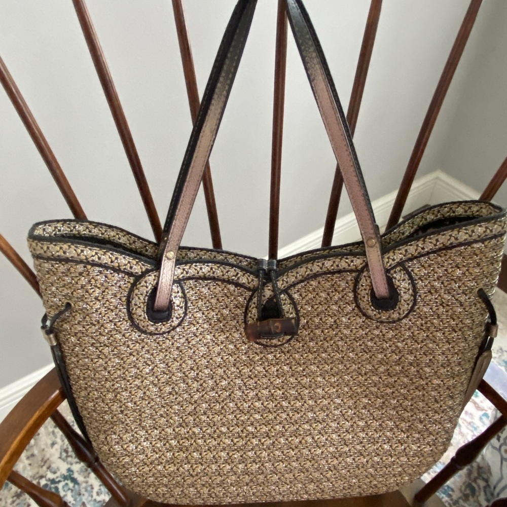 Eric Javits squishee synthetic straw, black & gold leather tote.